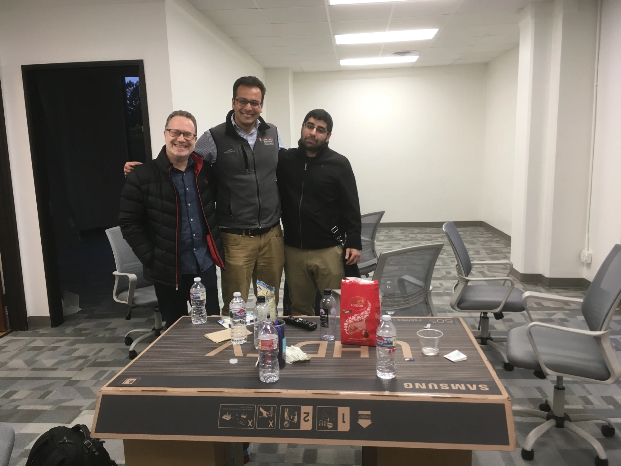 MyOme founders in an early office setting